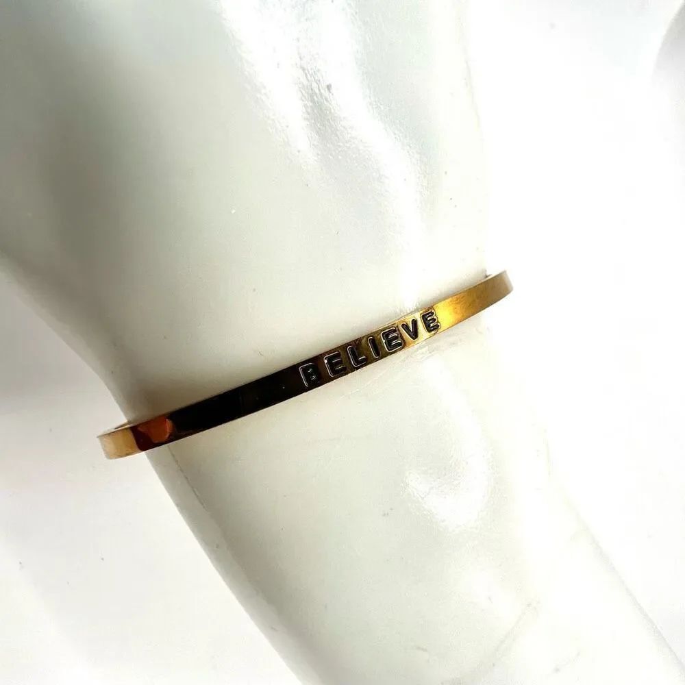 Gold tone Believe inspirational open cuff bracelet